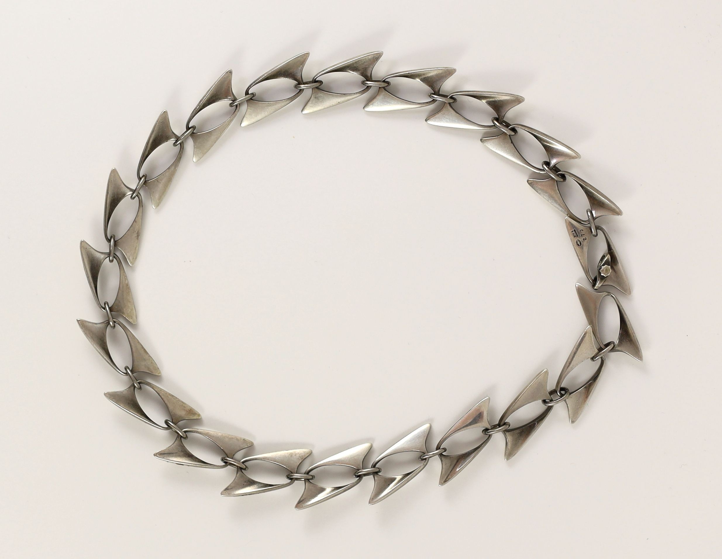 A Georg Jensen sterling silver stylised link necklace, designed by Henning Koppel, no. 273